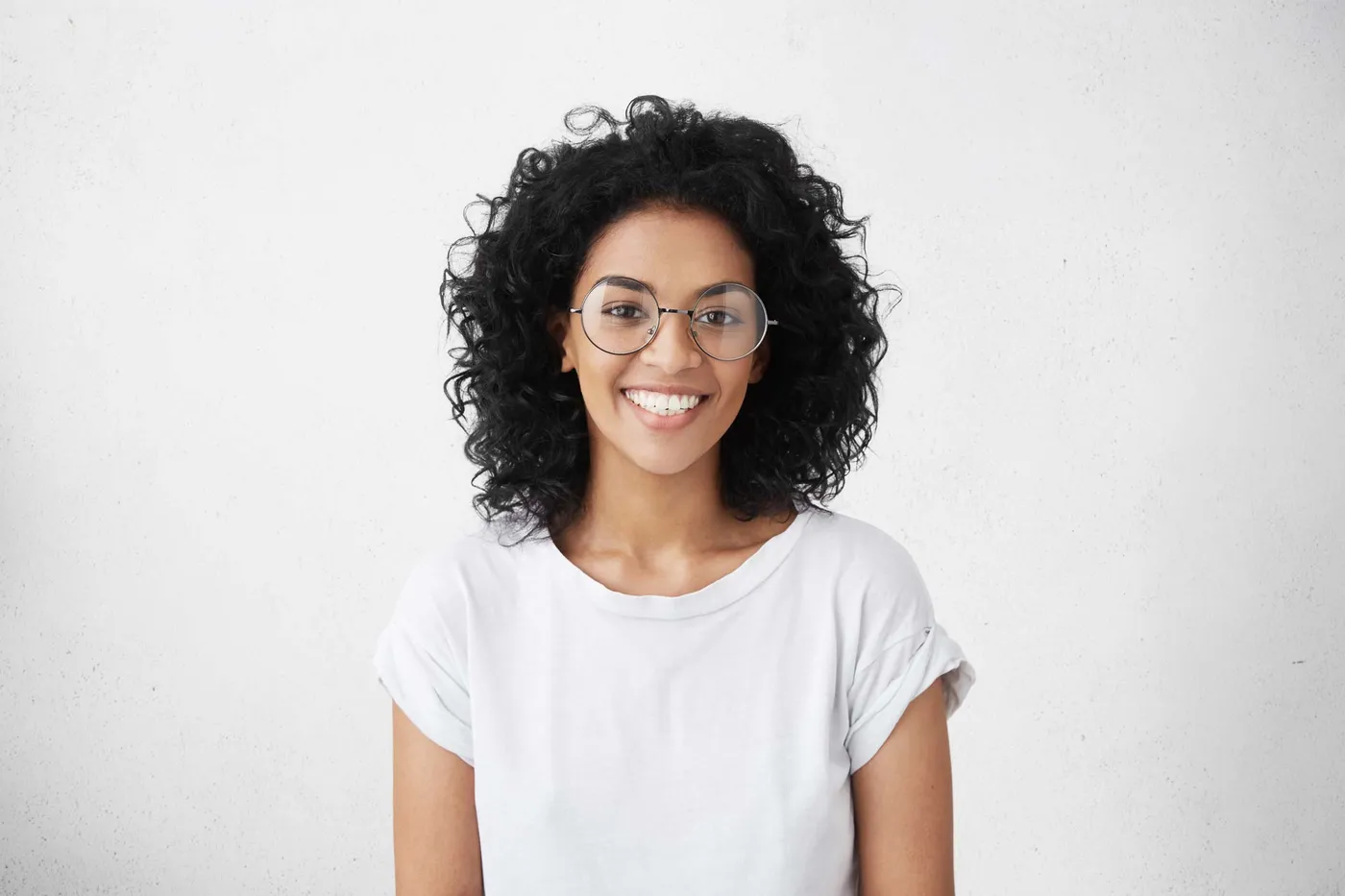 Woman in glasses smiling