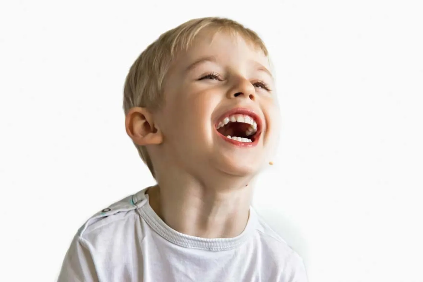 Young boy laughing